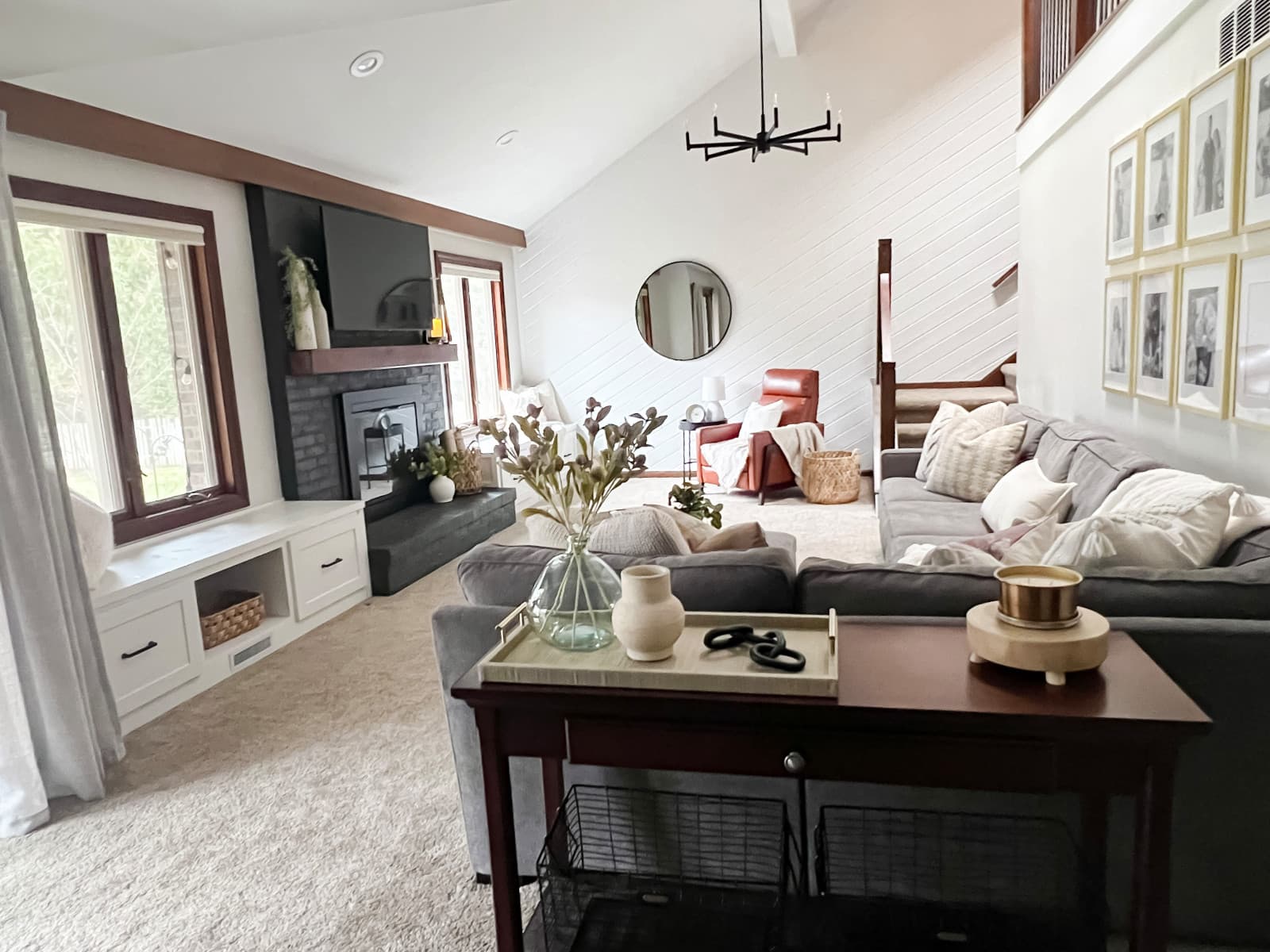 A Natassja Designs great room, styled with a gallery wall and layered textiles