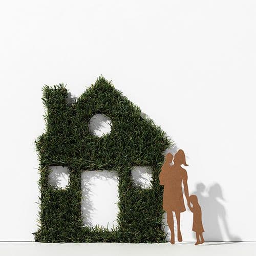 A house-shaped garden sculpture with open windows