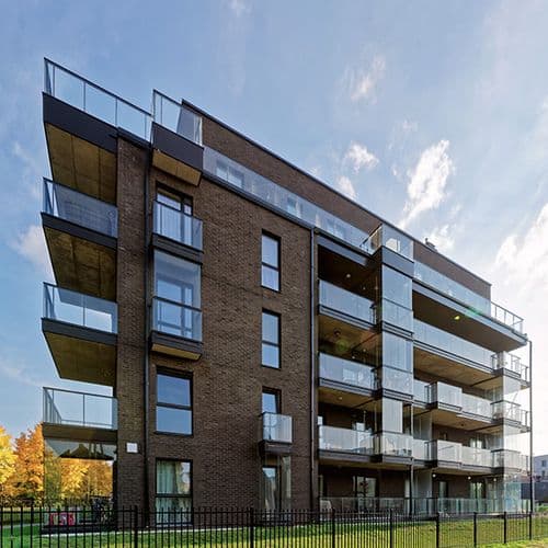 A modern residential building with balconies