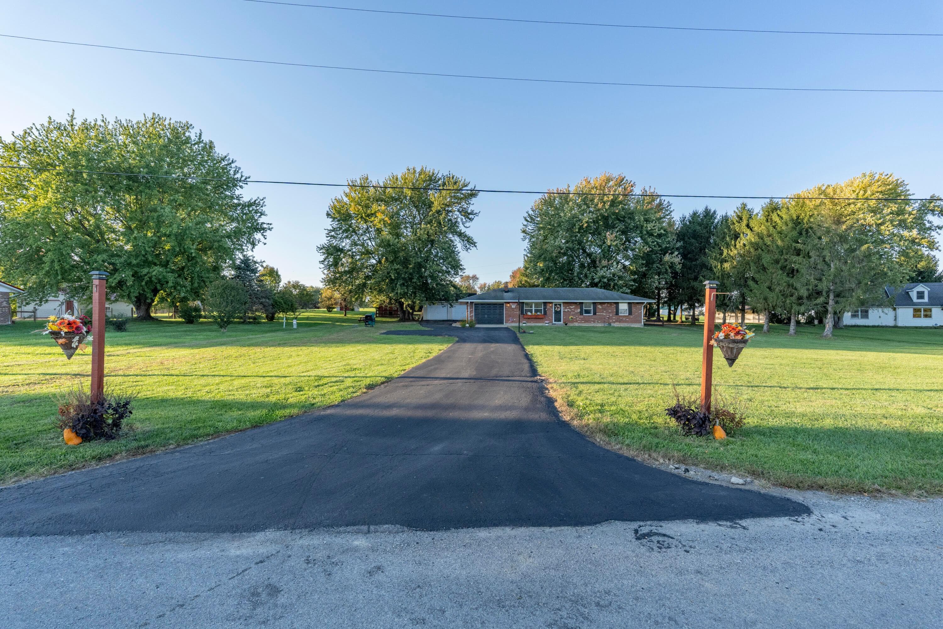 7018 Haggerty Road — photo 1 of 37